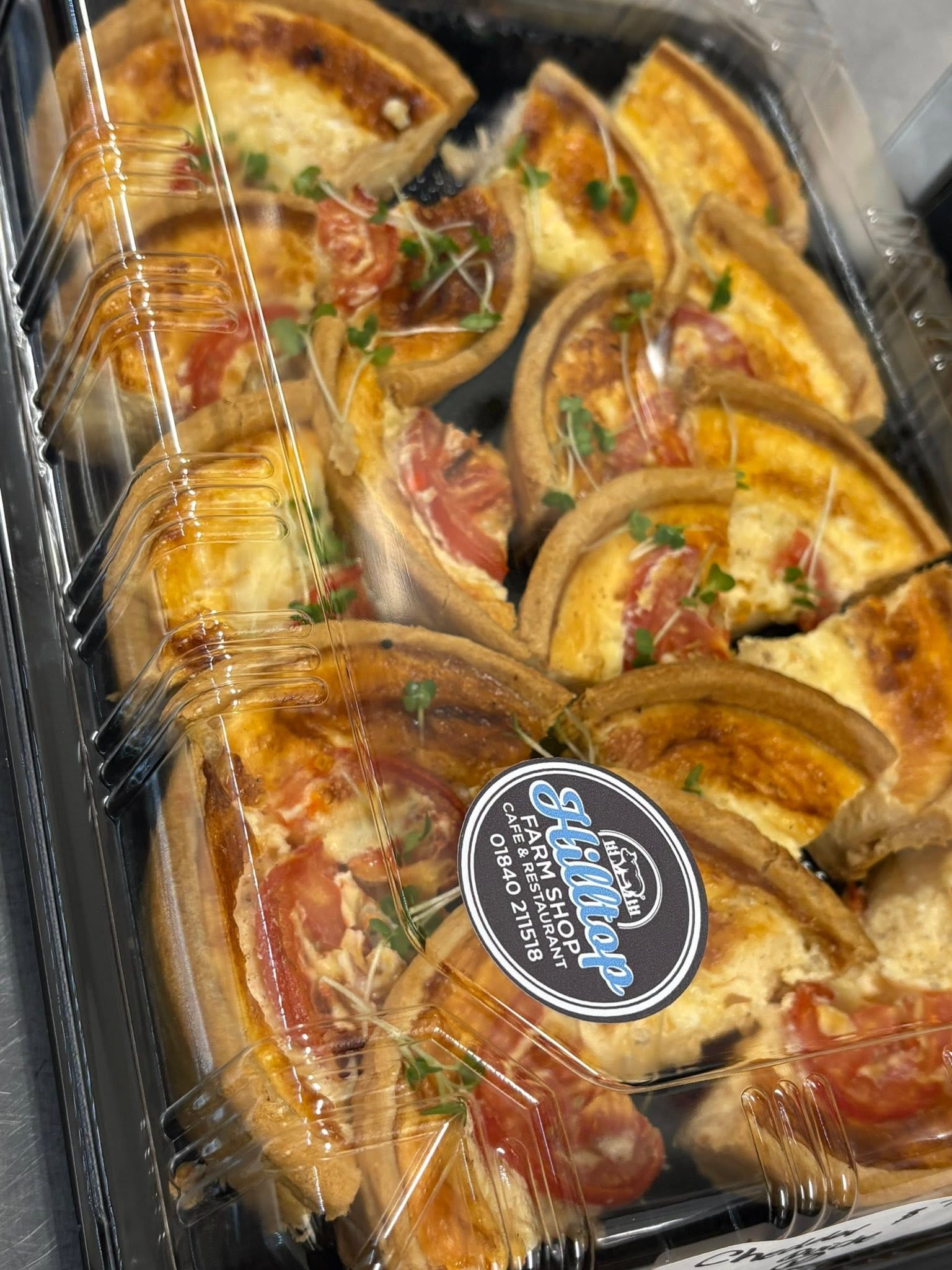 Homemade sliced quiches prepared for a Hilltop takeaway buffet