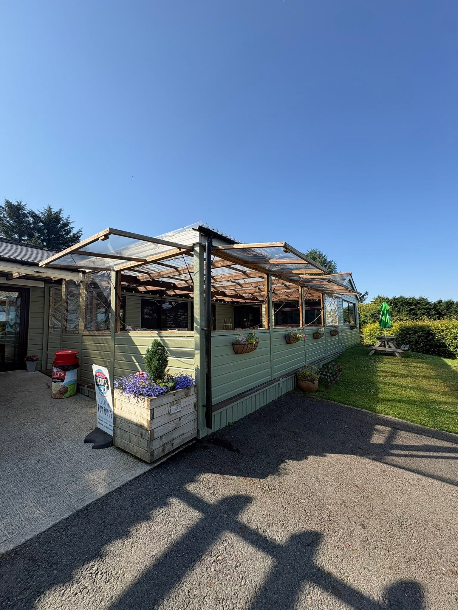 The covered café and garden seating area at Hilltop Farm Shop