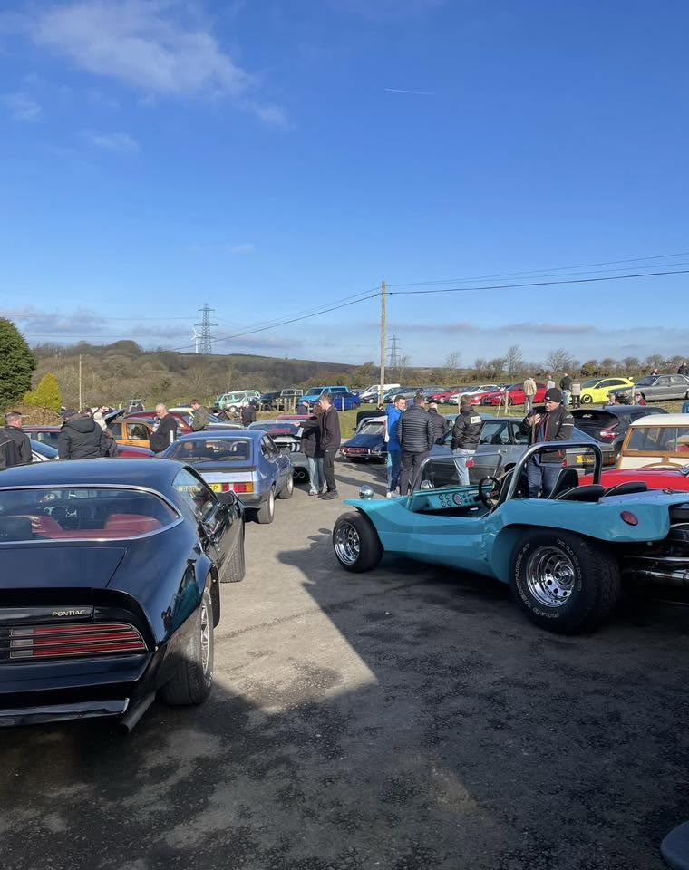 Cars gathered at a previous Hilltop Farm Shop car meet